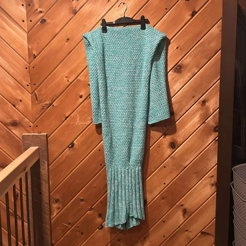 Handmade teal crocheted mermaid tail blanket